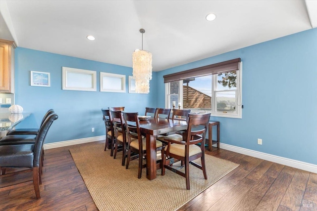 dining room featuring hardwood / wood-style flooring, recessed lighting, and baseboards