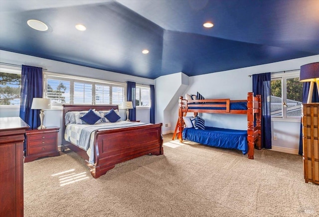 bedroom featuring recessed lighting, carpet, baseboards, and vaulted ceiling