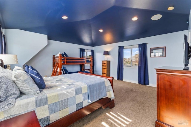 carpeted bedroom featuring lofted ceiling, recessed lighting, and baseboards