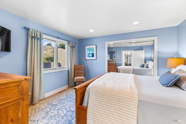 bedroom with recessed lighting and baseboards