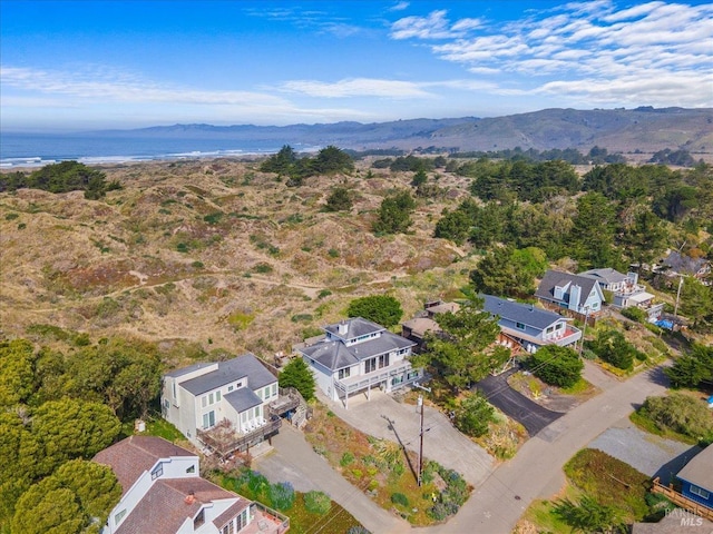 drone / aerial view with a mountain view and a residential view