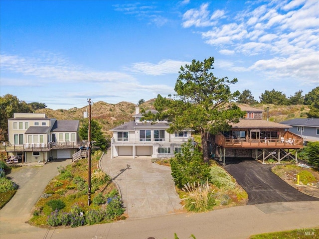 view of front of property with an attached garage and driveway