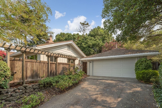 detached garage with fence