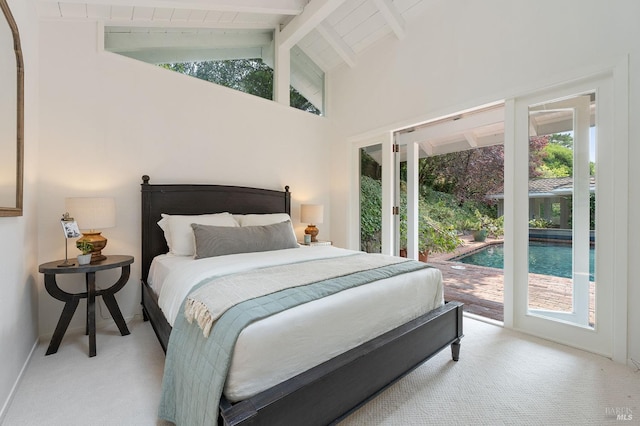 bedroom with access to exterior, baseboards, carpet, beamed ceiling, and high vaulted ceiling