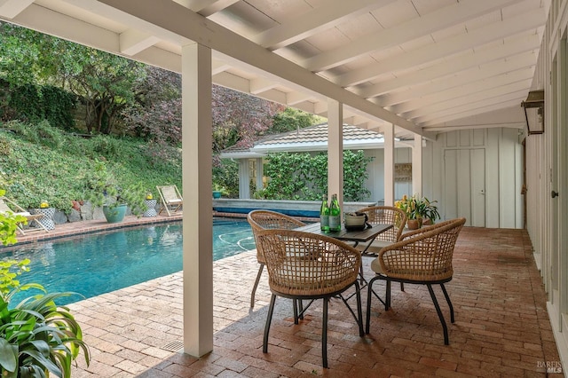 pool with a patio