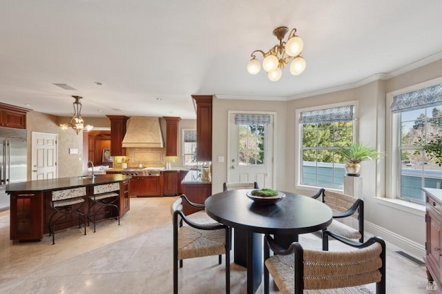15 Kingswood Dr, Petaluma, CA 94952 - dining room featuring a chandelier, ornamental molding, and light tile patterned floors