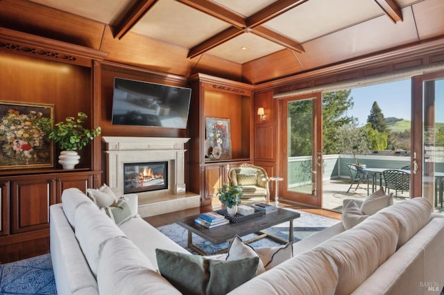 15 Kingswood Dr, Petaluma, CA 94952 - living room featuring wood finished floors, coffered ceiling, a high end fireplace, beamed ceiling, and wooden walls
