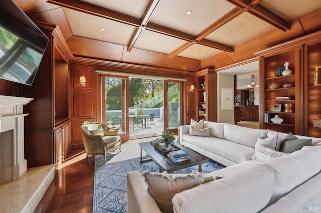 15 Kingswood Dr, Petaluma, CA 94952 - living area with built in features, wooden walls, coffered ceiling, a high end fireplace, and dark wood-style flooring