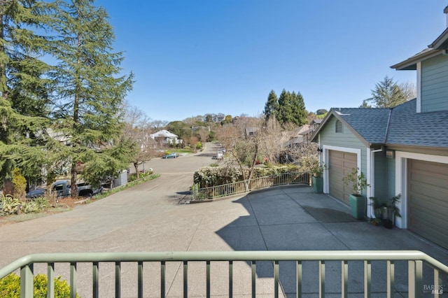 15 Kingswood Dr, Petaluma, CA 94952 - view of yard featuring driveway and an attached garage