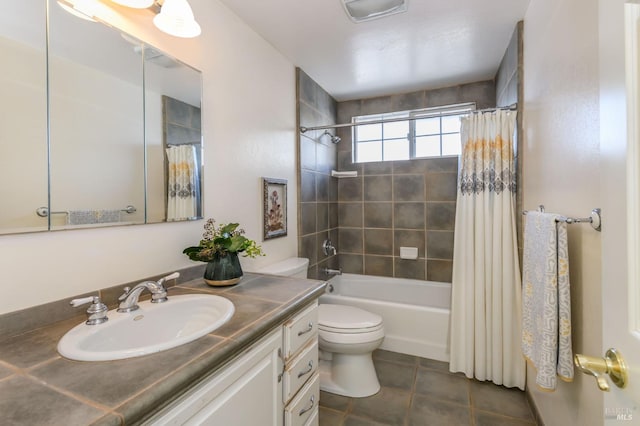 bathroom with visible vents, toilet, shower / bath combo, tile patterned flooring, and vanity