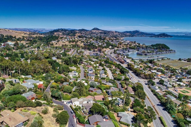 bird's eye view featuring a residential view and a water and mountain view