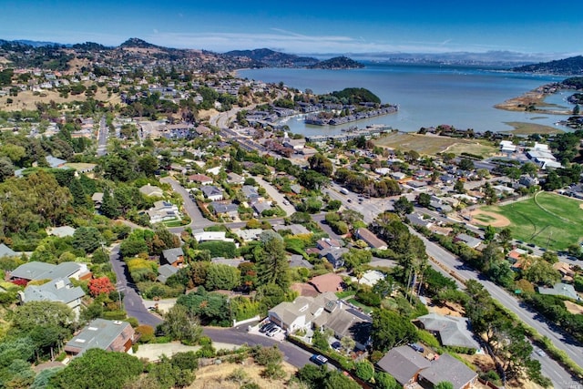 birds eye view of property with a residential view and a water view