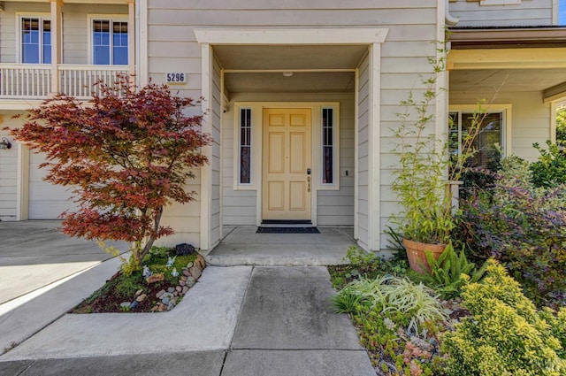 entrance to property featuring a garage