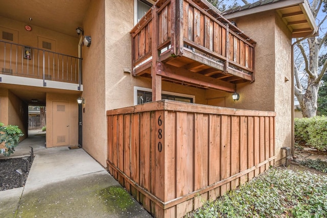 view of side of home featuring stucco siding