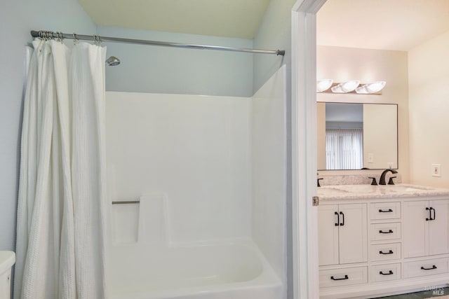 full bath with shower / bath combo with shower curtain, toilet, and vanity