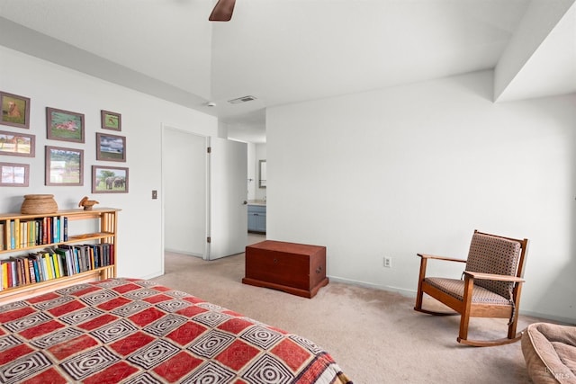 bedroom with visible vents, light carpet, baseboards, and a ceiling fan