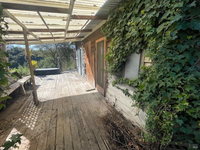 wooden terrace with a pergola