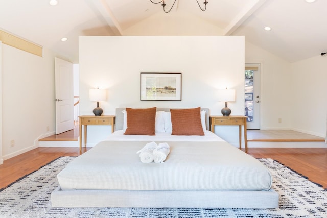 bedroom with lofted ceiling with beams, baseboards, wood finished floors, and recessed lighting