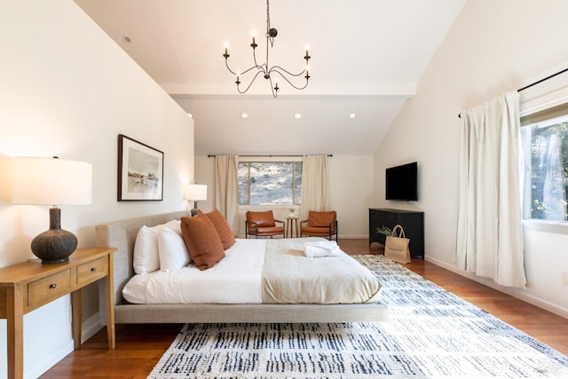 bedroom featuring beam ceiling, a notable chandelier, baseboards, and wood finished floors