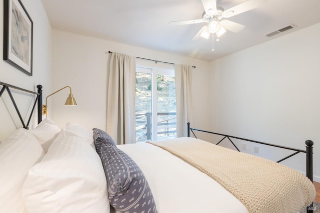 bedroom with visible vents and ceiling fan