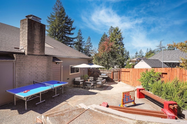 view of patio / terrace with fence