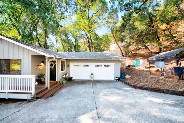 garage featuring driveway