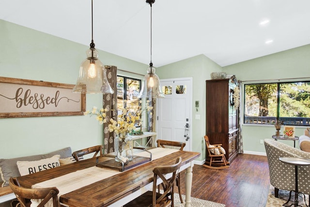 dining room featuring recessed lighting, baseboards, wood finished floors, and vaulted ceiling