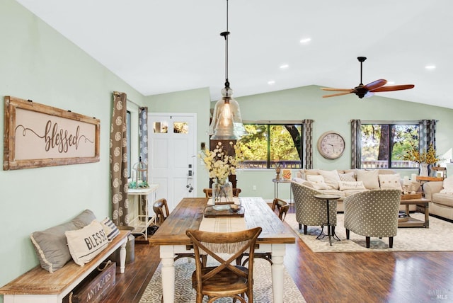 dining area featuring lofted ceiling, recessed lighting, and dark wood-type flooring