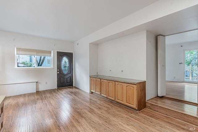 entryway with light wood-type flooring