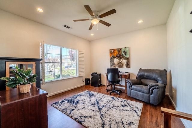 office space featuring recessed lighting, wood finished floors, and visible vents