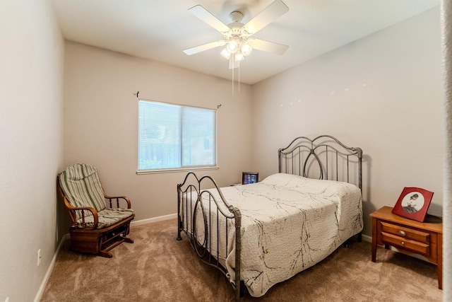 bedroom featuring baseboards, carpet floors, and ceiling fan