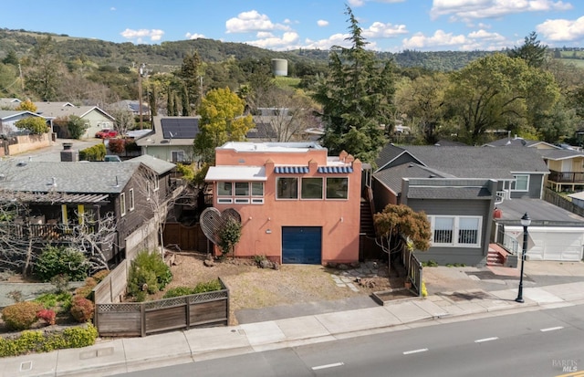 birds eye view of property with a residential view