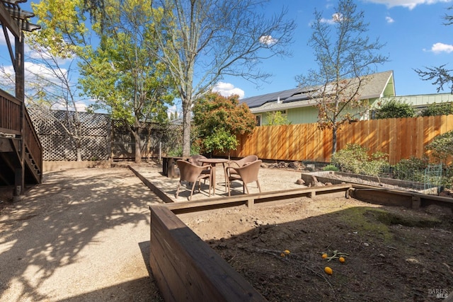 view of yard featuring a patio and a fenced backyard