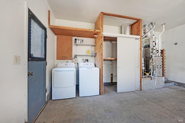 laundry room featuring laundry area and washing machine and clothes dryer