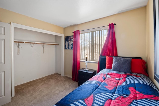 carpeted bedroom featuring a closet