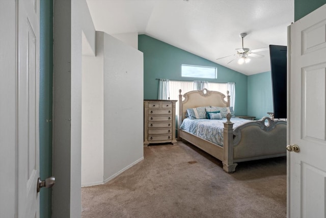 carpeted bedroom with ceiling fan and lofted ceiling