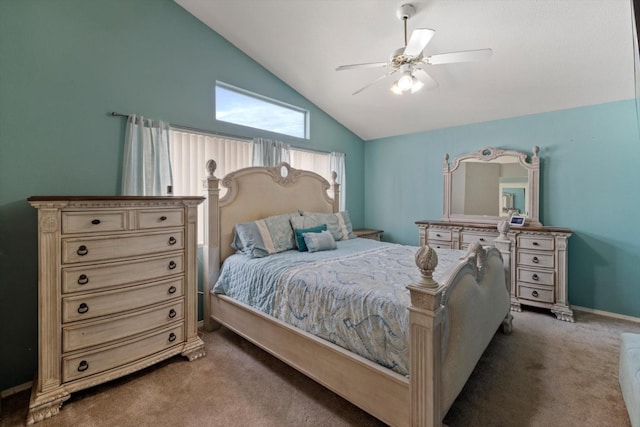 carpeted bedroom featuring baseboards, lofted ceiling, and ceiling fan