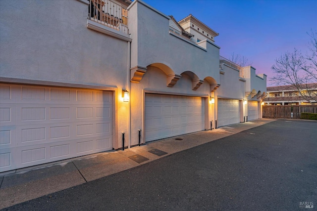 garage featuring driveway