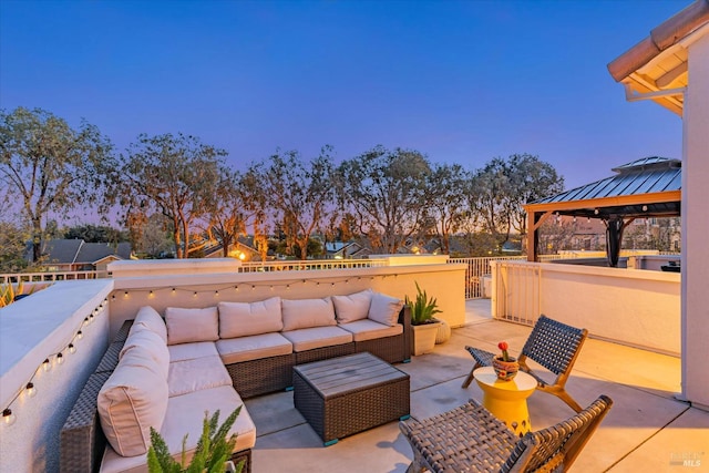 view of patio / terrace featuring outdoor lounge area and a gazebo