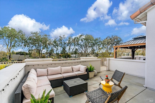view of patio / terrace featuring outdoor lounge area and a gazebo