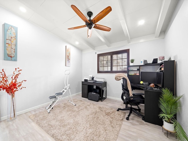 office space featuring ceiling fan, baseboards, beam ceiling, and wood finished floors