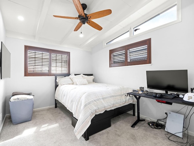 bedroom featuring baseboards, carpet floors, a ceiling fan, and vaulted ceiling with beams