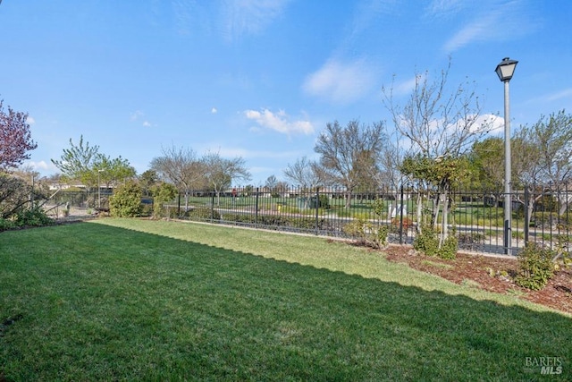 view of yard featuring fence