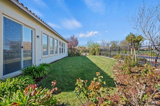 view of yard featuring a fenced backyard