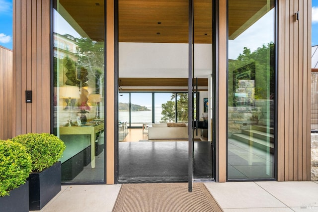 property entrance with a water view