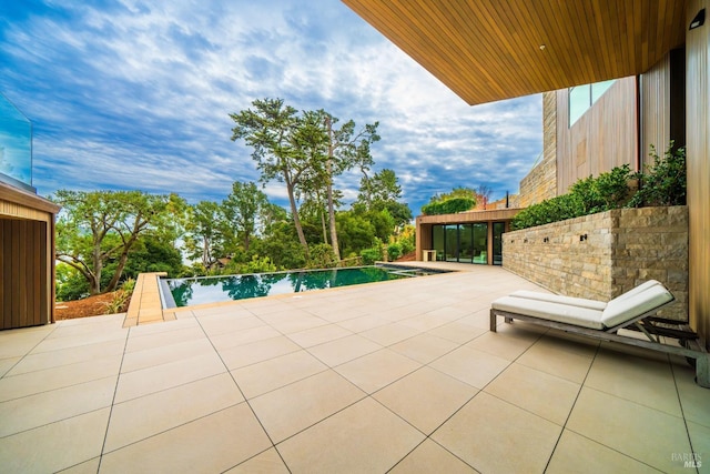 pool featuring a patio