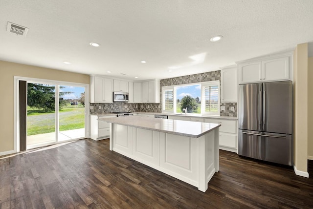 9862 Whalen Rd, Wallace, CA 95252 - kitchen with stainless steel appliances, a sink, light countertops, tasteful backsplash, and dark wood-style flooring