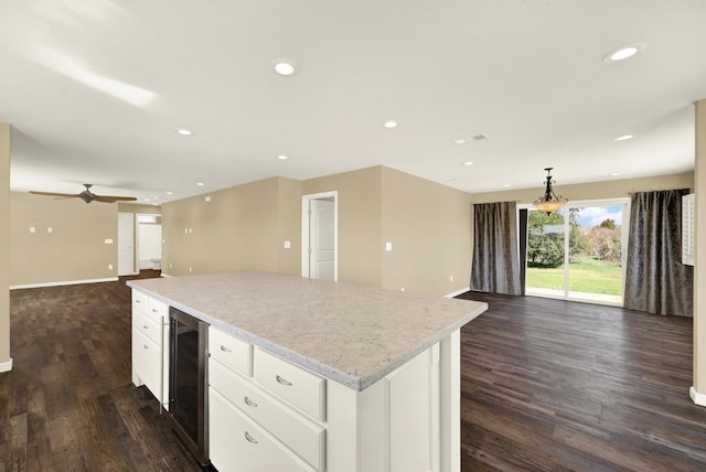 9862 Whalen Rd, Wallace, CA 95252 - kitchen featuring open floor plan, beverage cooler, a center island, dark wood-type flooring, and recessed lighting