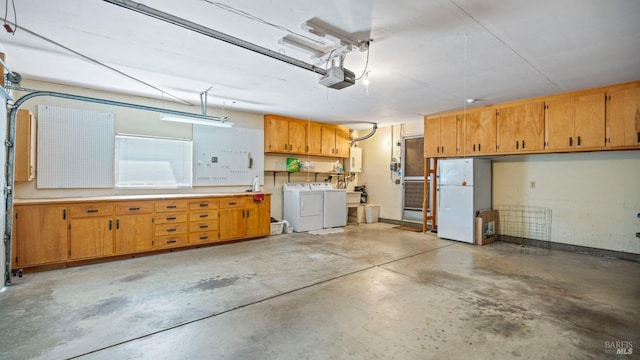 3022 Vista Grande, Fairfield, CA 94534 - garage featuring independent washer and dryer, freestanding refrigerator, water heater, and a garage door opener
