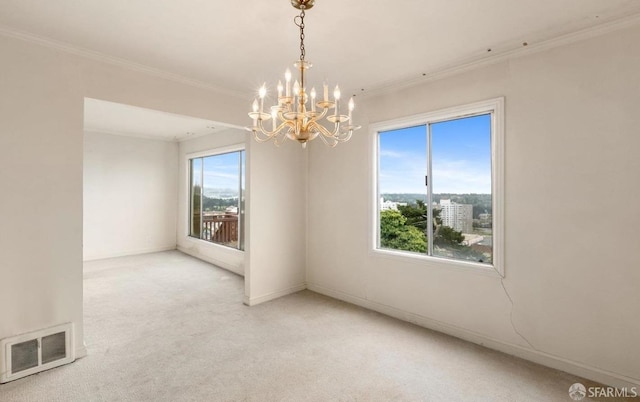 empty room featuring visible vents, baseboards, light colored carpet, ornamental molding, and an inviting chandelier